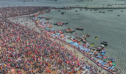 Mauni Amavasya: crowds bathing at the river ghats on a holy day