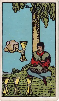 Four of Cups. A young man sits under a tree with arms folded, ignoring a cup offered by a hand from a cloud, three cups already at his feet.