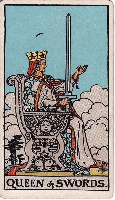 Queen of Swords. A crowned woman sits facing forward with an upright sword in one hand and the other raised open, clouds and one bird behind.