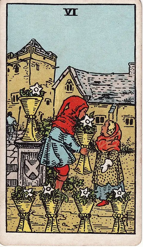 Six of Cups. A child hands a cup of white flowers to a smaller child in a walled courtyard, four more flower-filled cups around them.