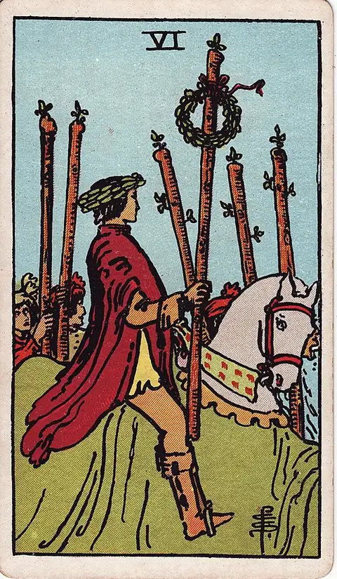 Six of Wands. A rider crowned with laurel carries a laurelled staff through a crowd of walking figures with staves.