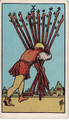 Ten of Wands. A man carries all ten staves in a bundle before him, bent under them, with a farmhouse close ahead.
