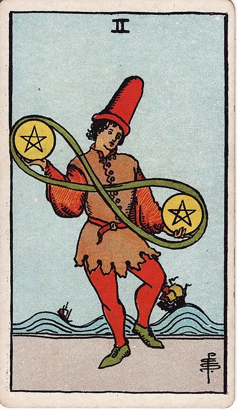 Two of Pentacles. A young man dances juggling two coins joined by a green lemniscate, two ships riding high waves behind him.